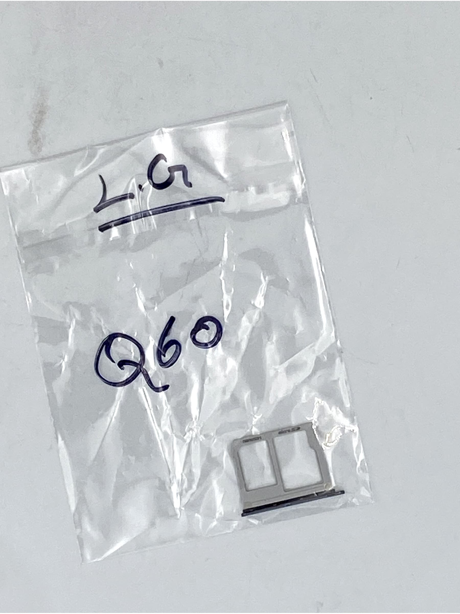 LG Q60 SIM tray view 1