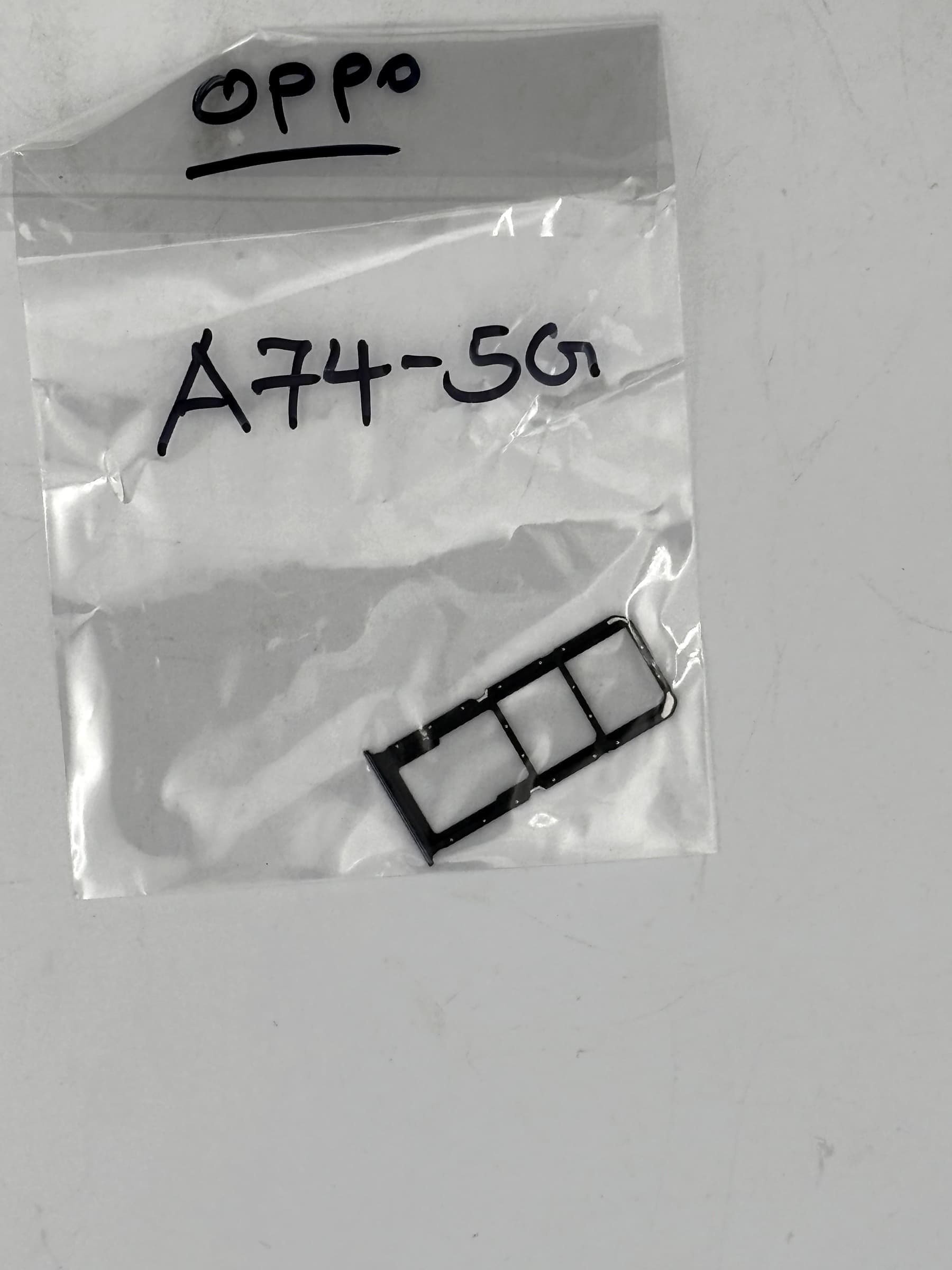 Oppo A74 5G SIM tray view 1